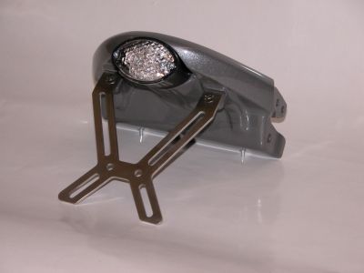 Micro Cat Eye LED Rckleuchte inkl. Kennzeichenbeleuchtung, Glas transparent - Gre ca. 68 mm x 42 mm