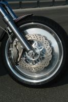 Front rim original broadened and modified to 4 x 18 to mount a 130/60 ZR 18 front wheel tire for all Harley-Davidson VRSC-A, -B and D V-Rod models
